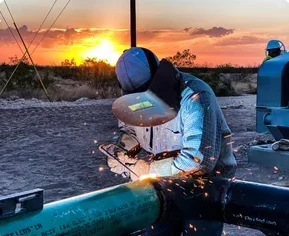 Engineers collaborating at an industrial facility